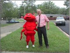 Freddy the Fire Ant, mascot of Marshall Fire Ant Festival with B. Drees.
